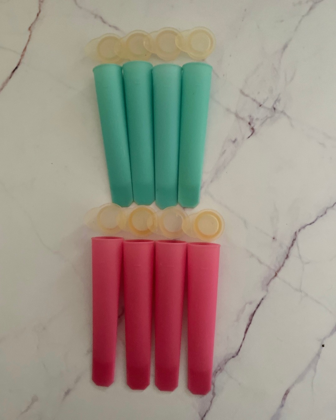 Pink (4) and turquoise (4) lollipop makers