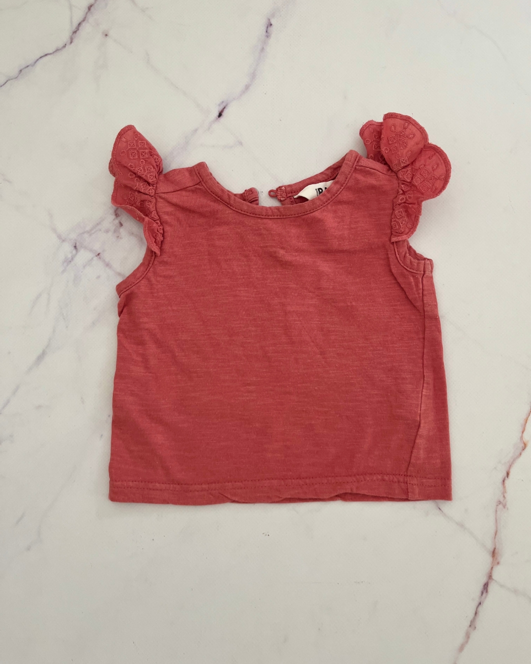 Cotton On pink top with frilly shoulders 3/6M