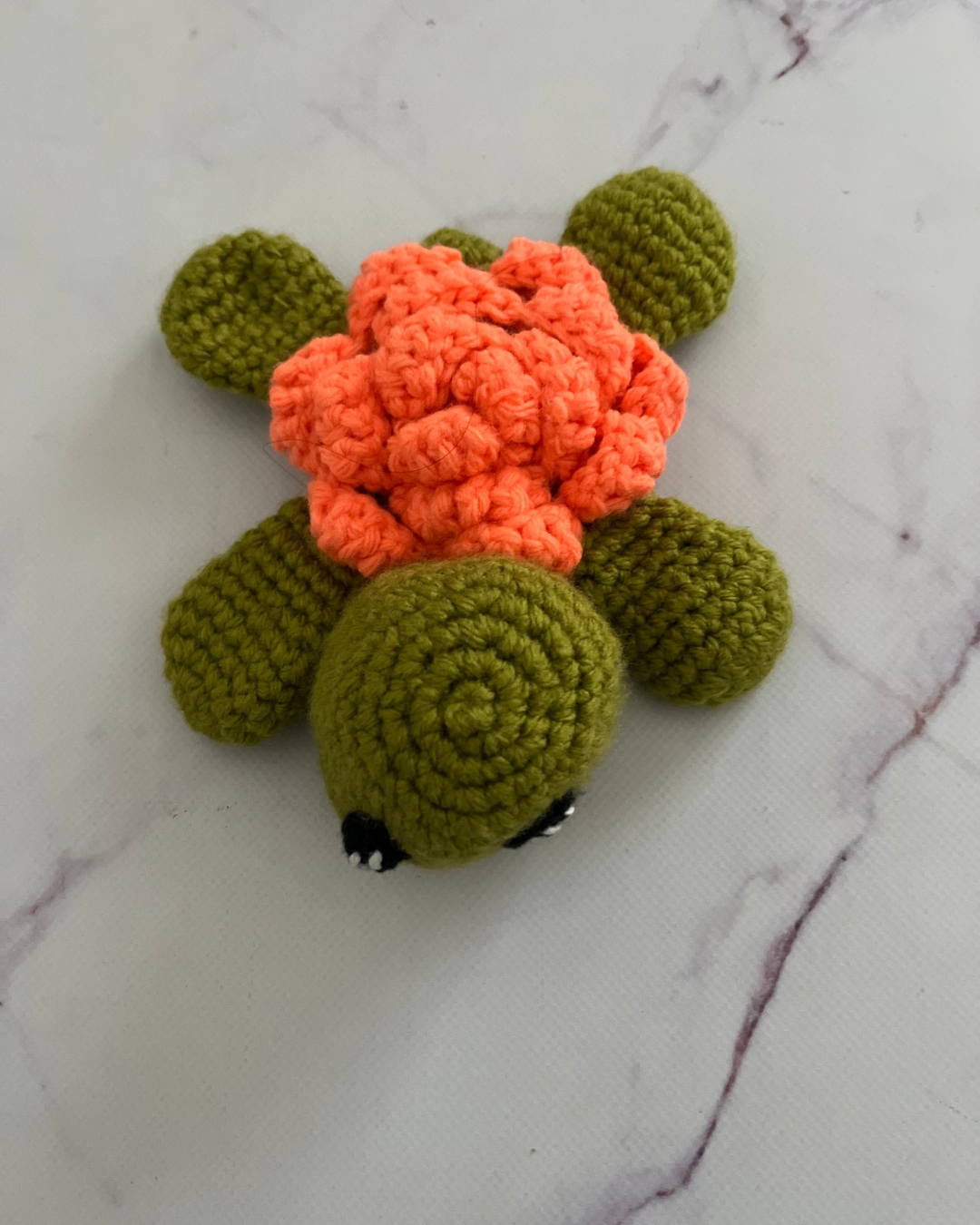 Crochet green and orange turtle toy