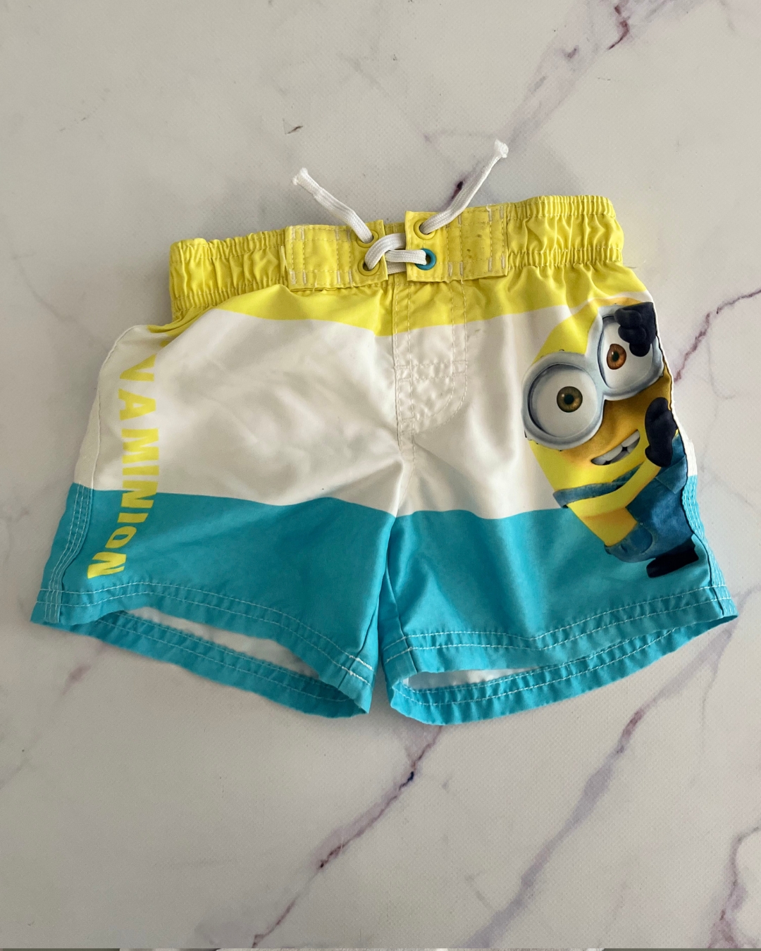 Minions white, yellow and blue board shorts 9/12M