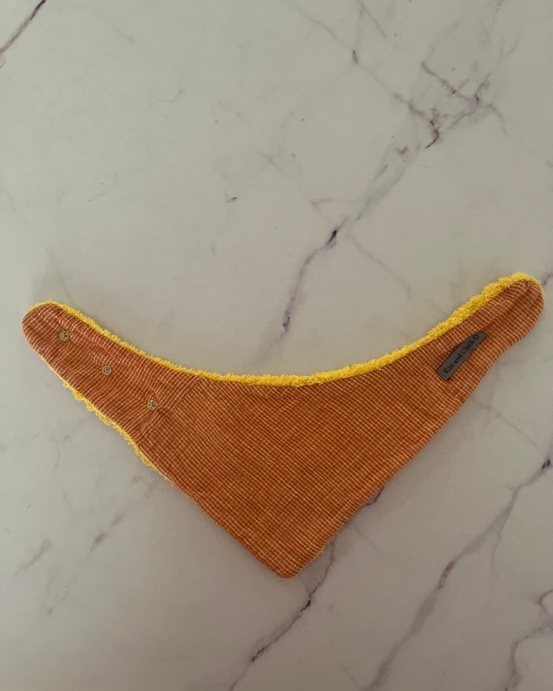 Kin & Cloth orange bib