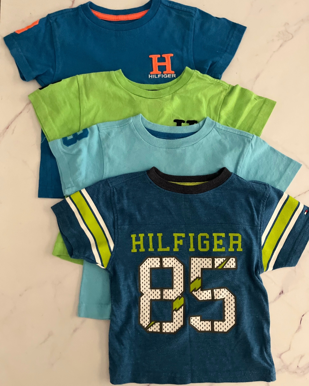 Tommy Hilfiger dark blue, blue 85, light blue and green T shirt set 2Y
