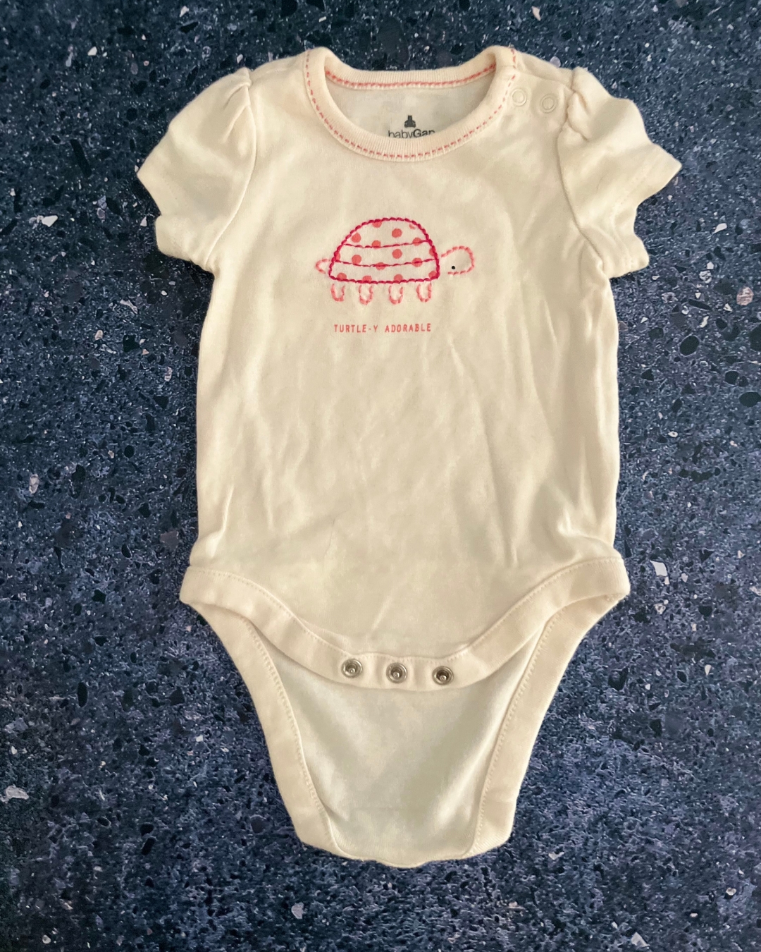 Baby beige turtle baby grow 0/3M