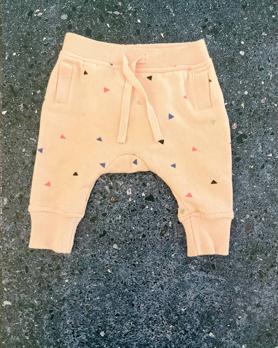 Cotton On peach triangles pants 0/3M