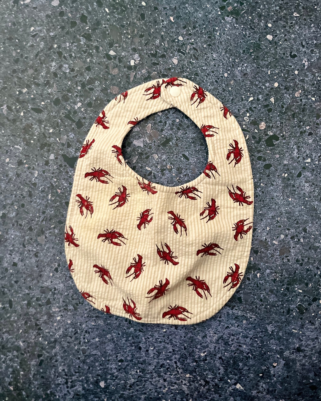 Blue and white striped crab bib
