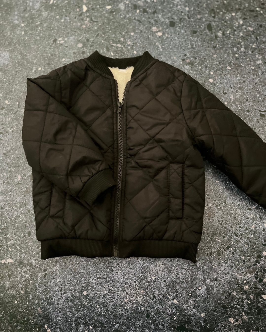 Black fleece lined jacket 12/18M