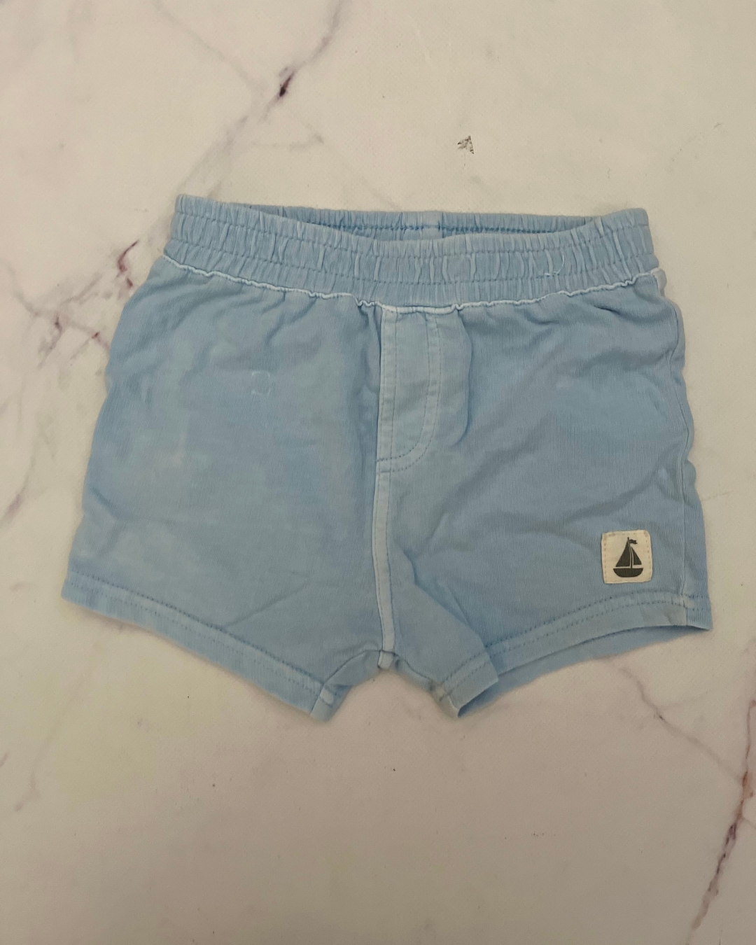 Cotton On light blue shorts 6/12M