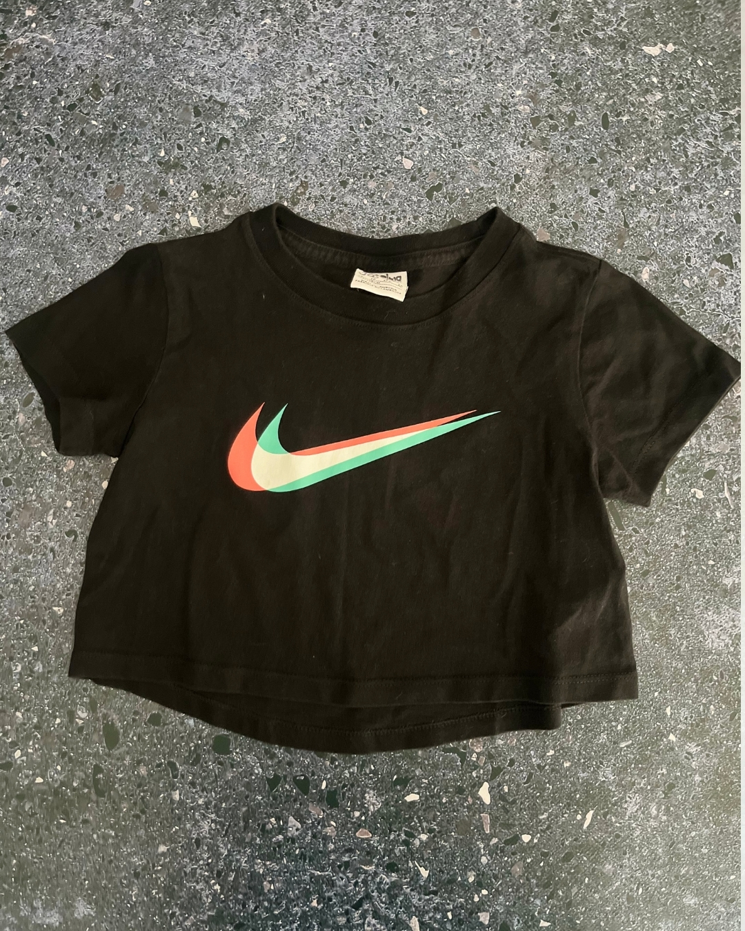 Nike black T-shirt with green and peach logo 7/8Y