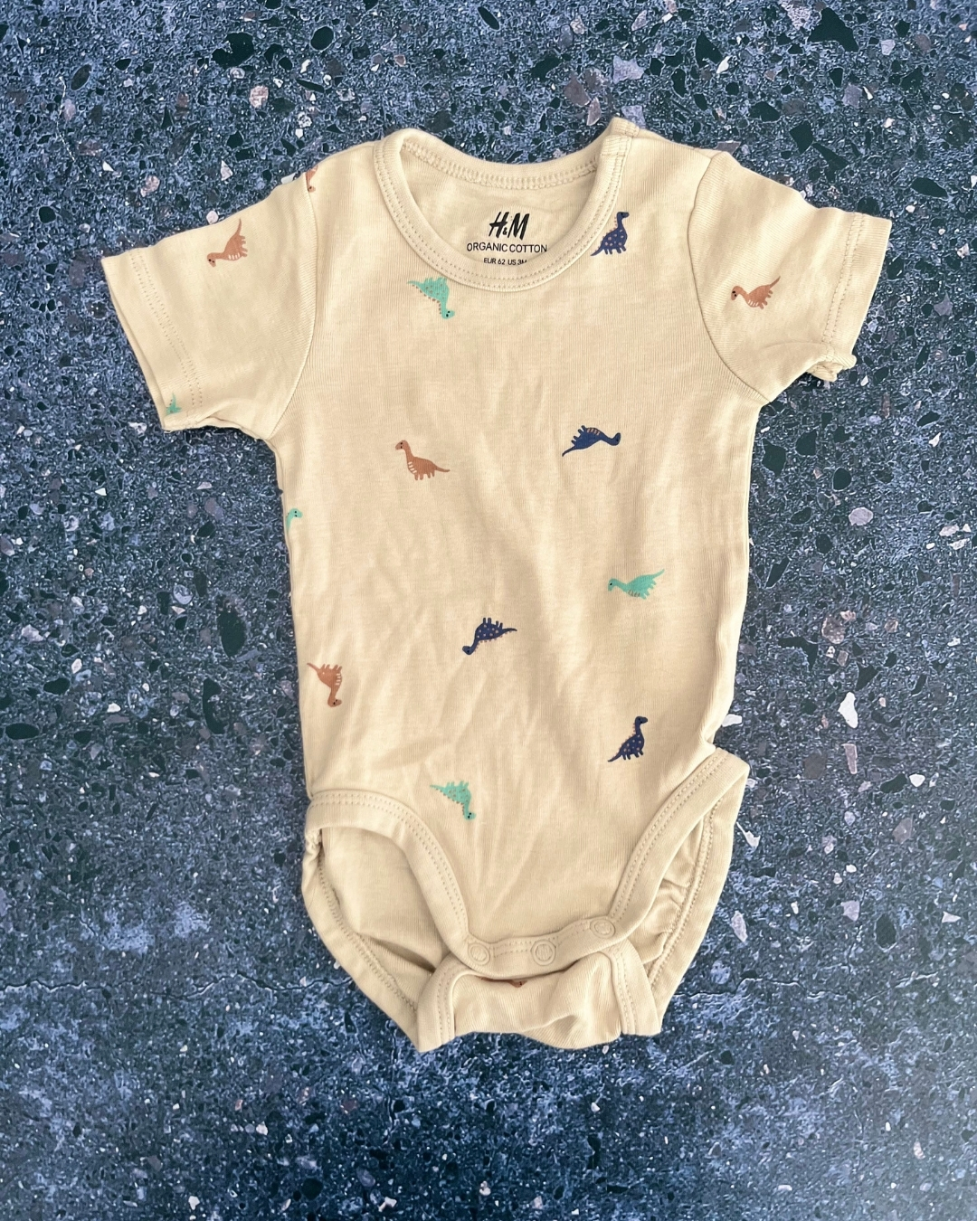 H&M beige dinosaur baby grow 2/4M