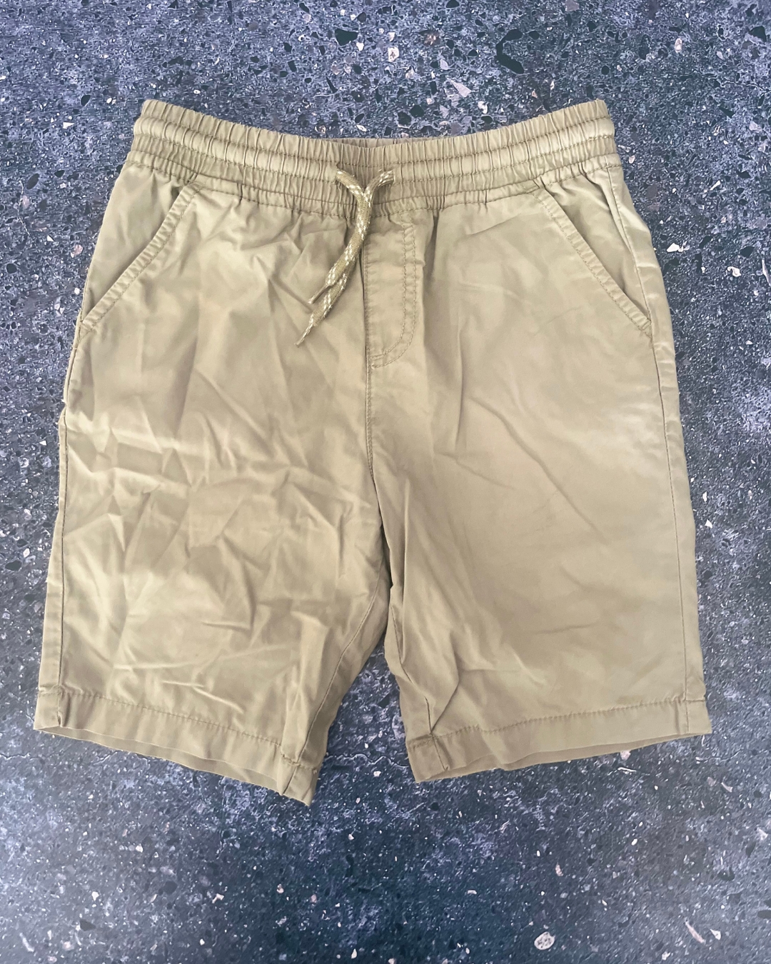 Woolworths green shorts 8Y