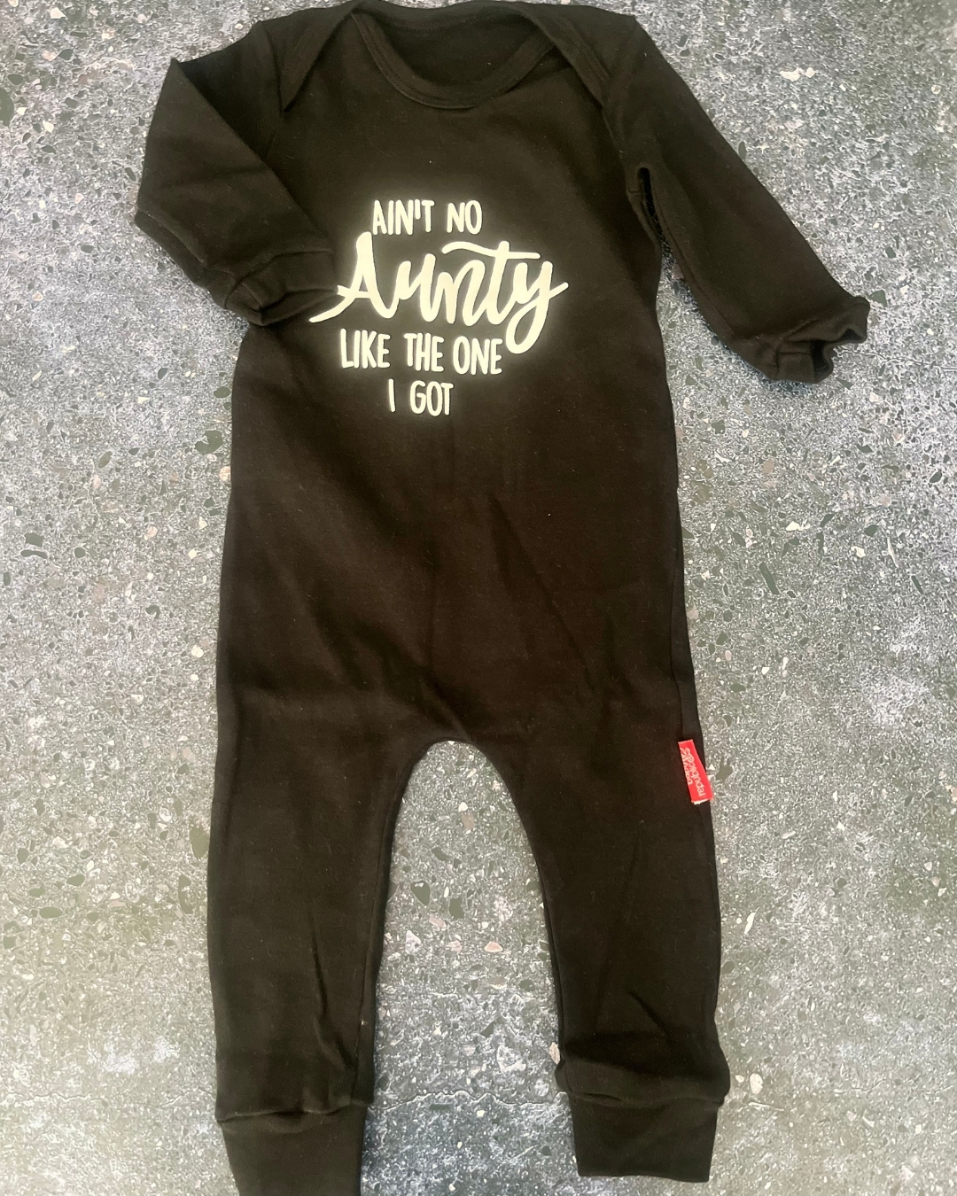 Baby Republic black Aunty onesie 12/18M