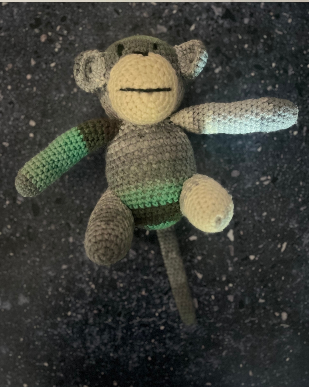 Knitted monkey toy