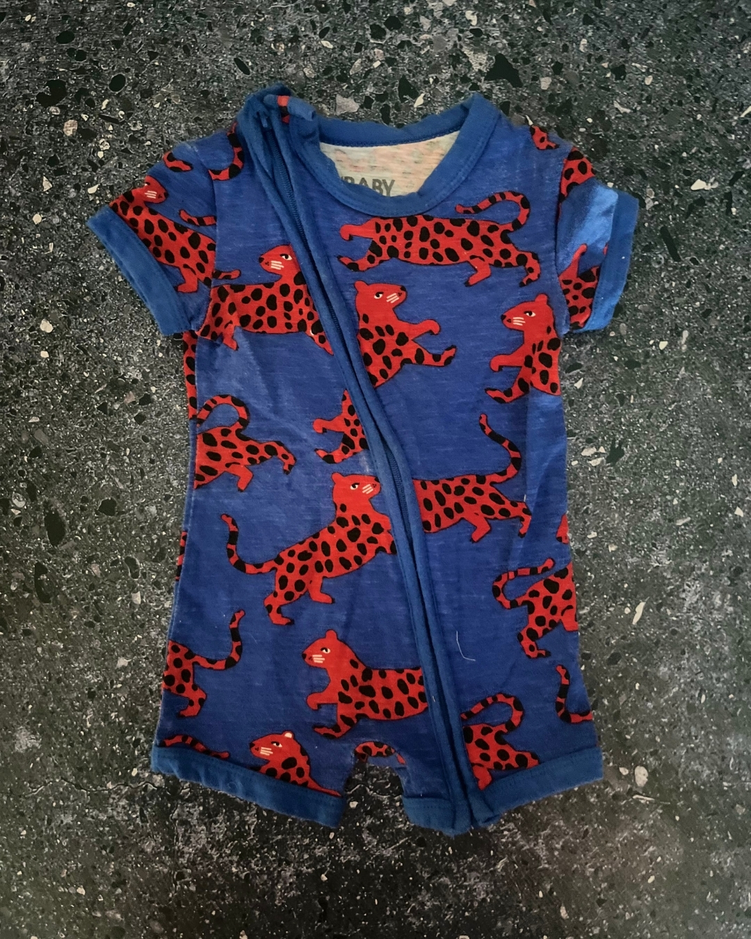 Cotton On blue cheetah romper 3/6M