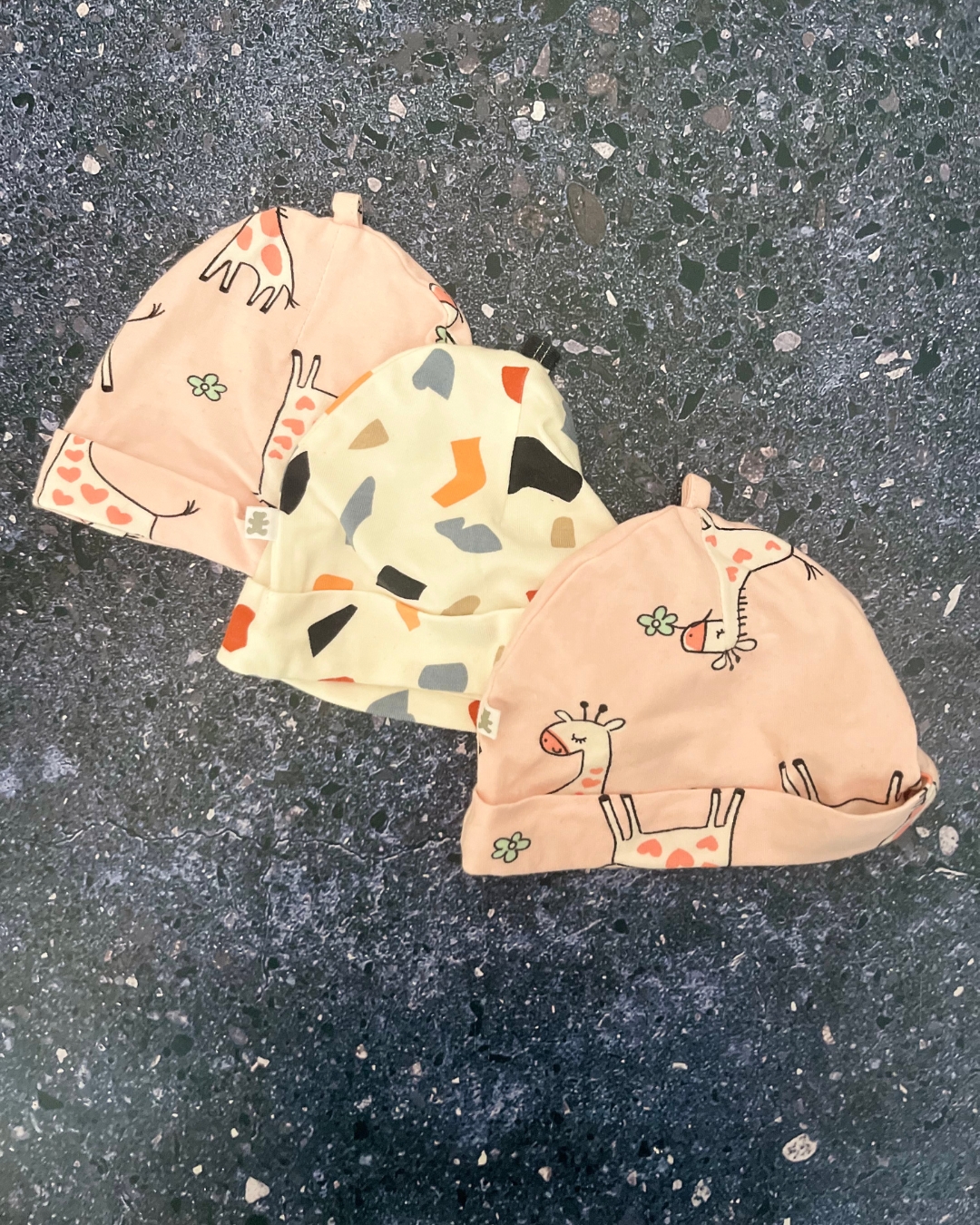 Woolworths pink giraffes (2) and shapes beanie set 3/6M