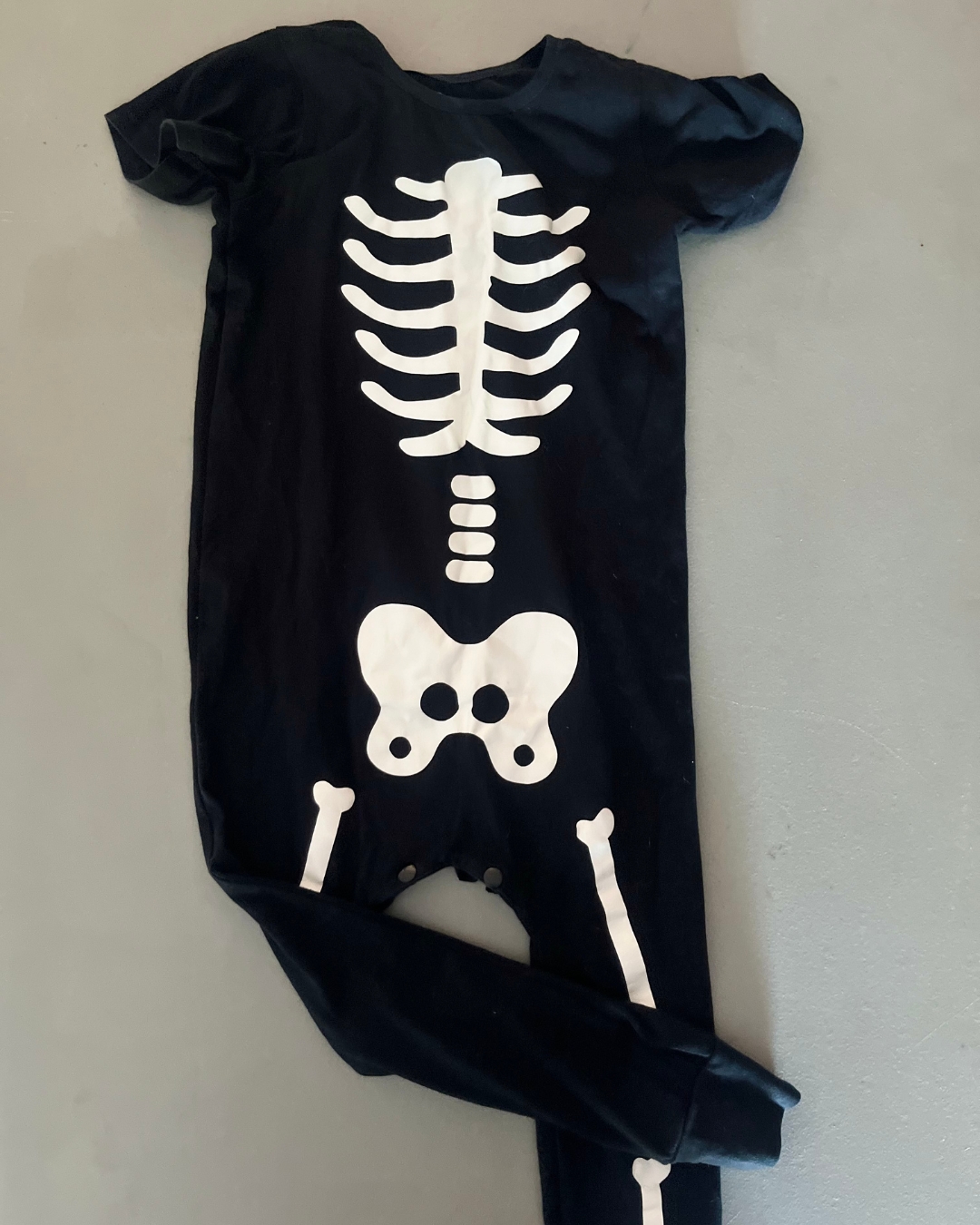 Lucky Little black skeleton onesie 5Y