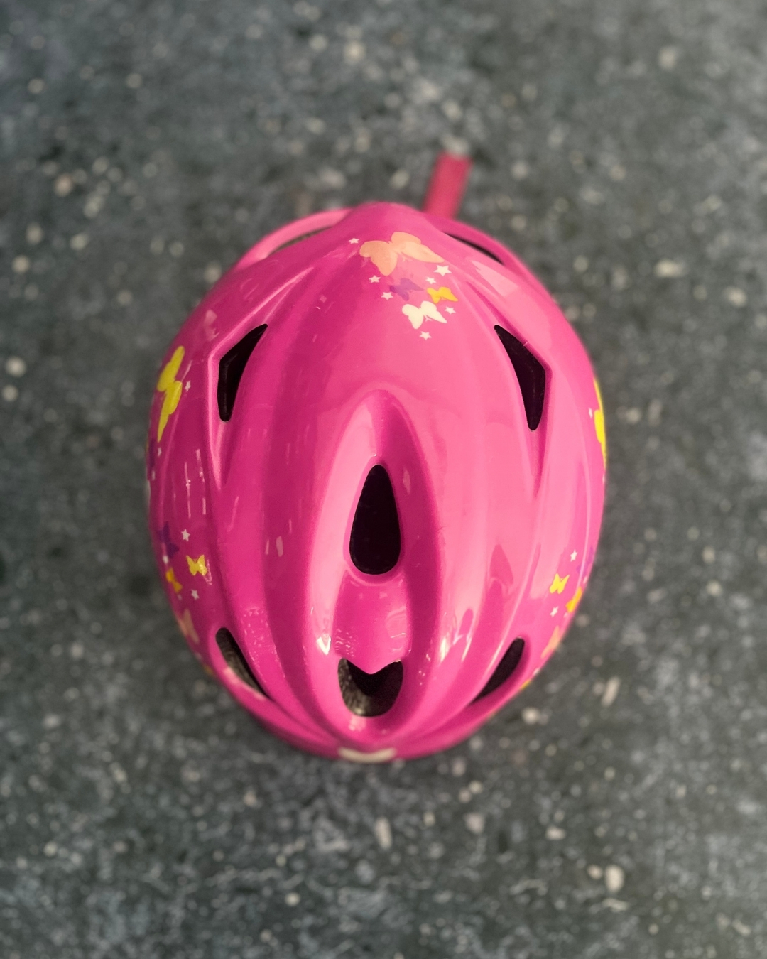 Munn pink butterfly cycling helmet