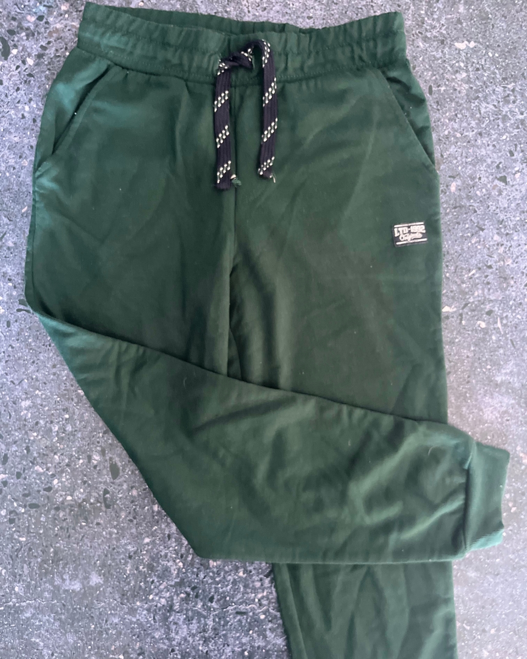 LTD green tracksuit pants 11/12Y