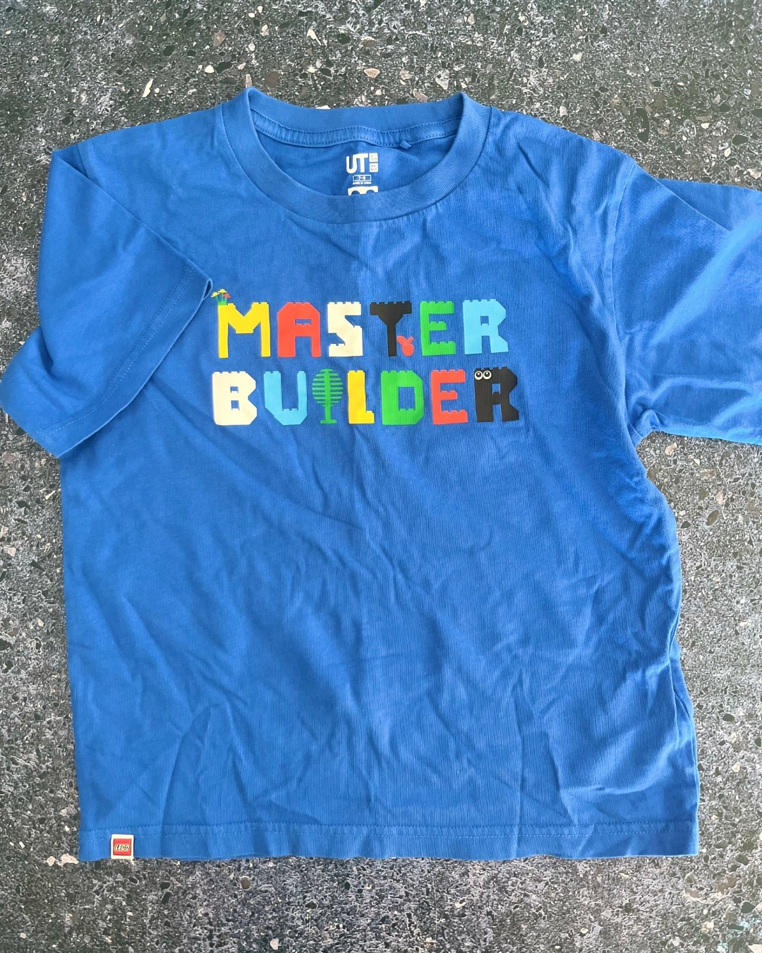 Uniqlo blue Master Builder T-shirt 7/8Y
