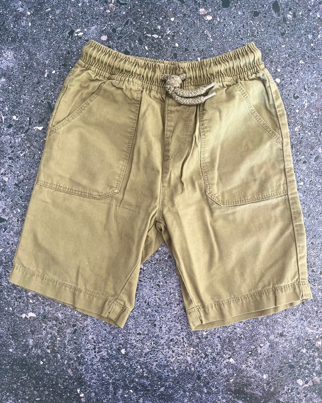 Woolworths green shorts 8Y